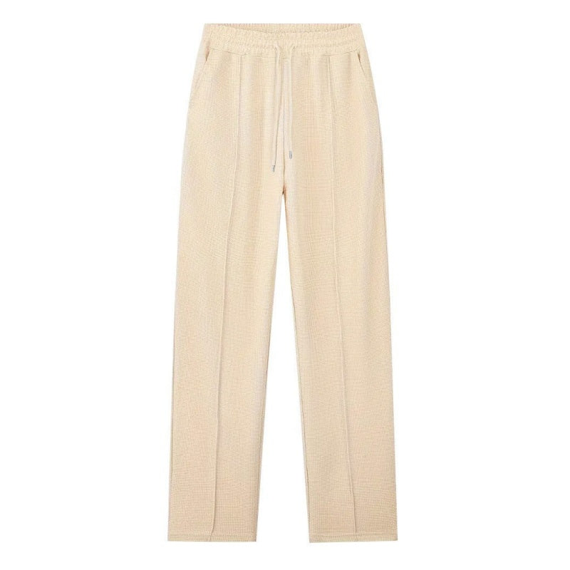 Conjunto para hombre compuesto por sudadera con tejido de punto gofrado y pantalón de pierna recta.