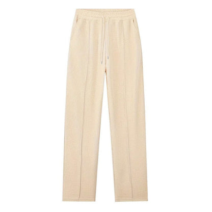 Conjunto para hombre compuesto por sudadera con tejido de punto gofrado y pantalón de pierna recta.