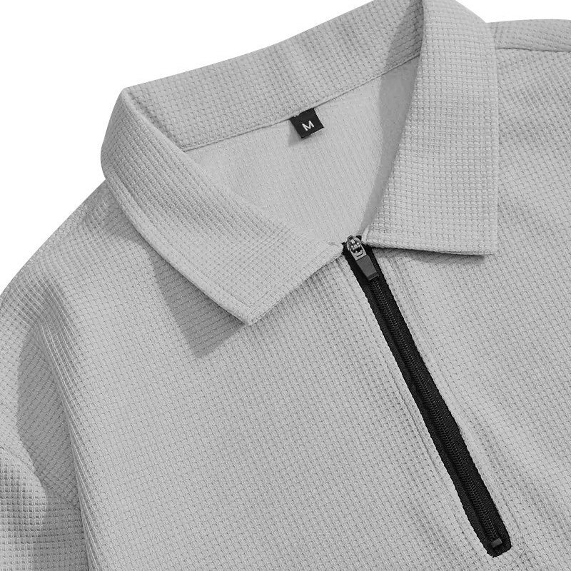 Conjunto para hombre compuesto por sudadera con tejido de punto gofrado y pantalón de pierna recta.