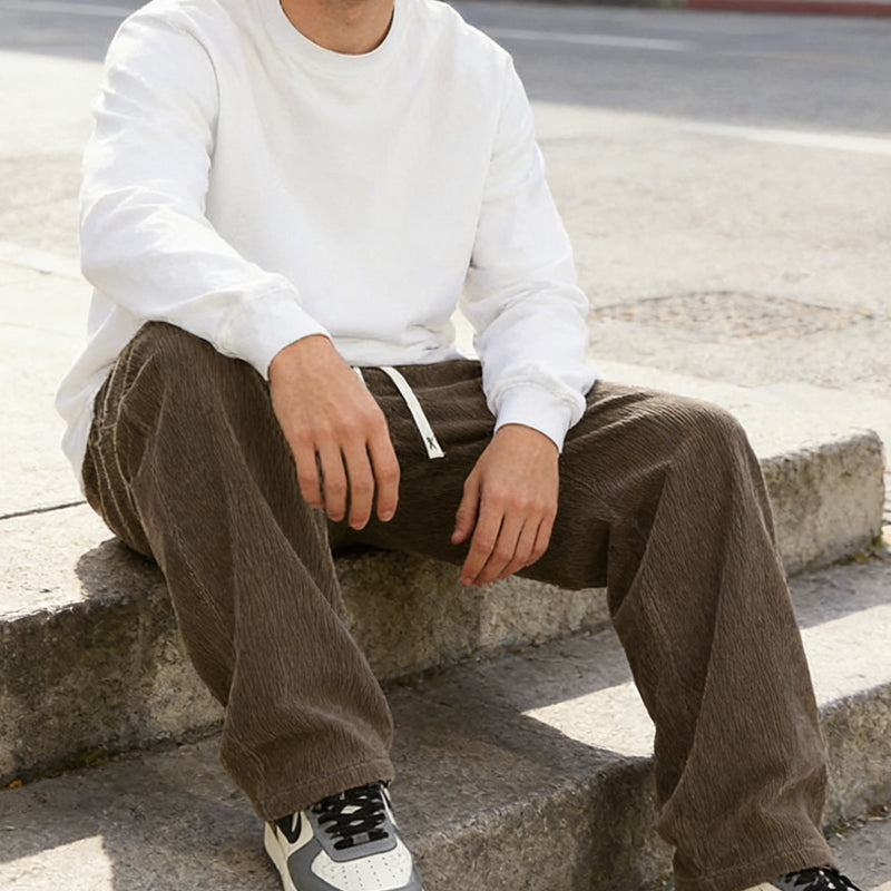 Pantalones de hombre con corte holgado, cordón y bolsillos