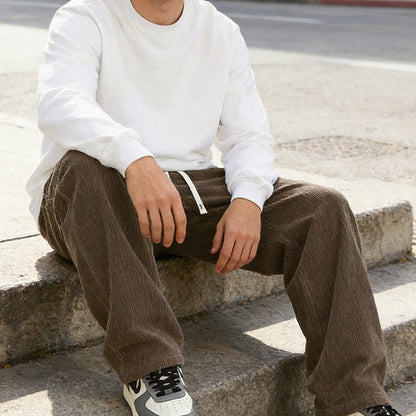 Pantalones de hombre con corte holgado, cordón y bolsillos